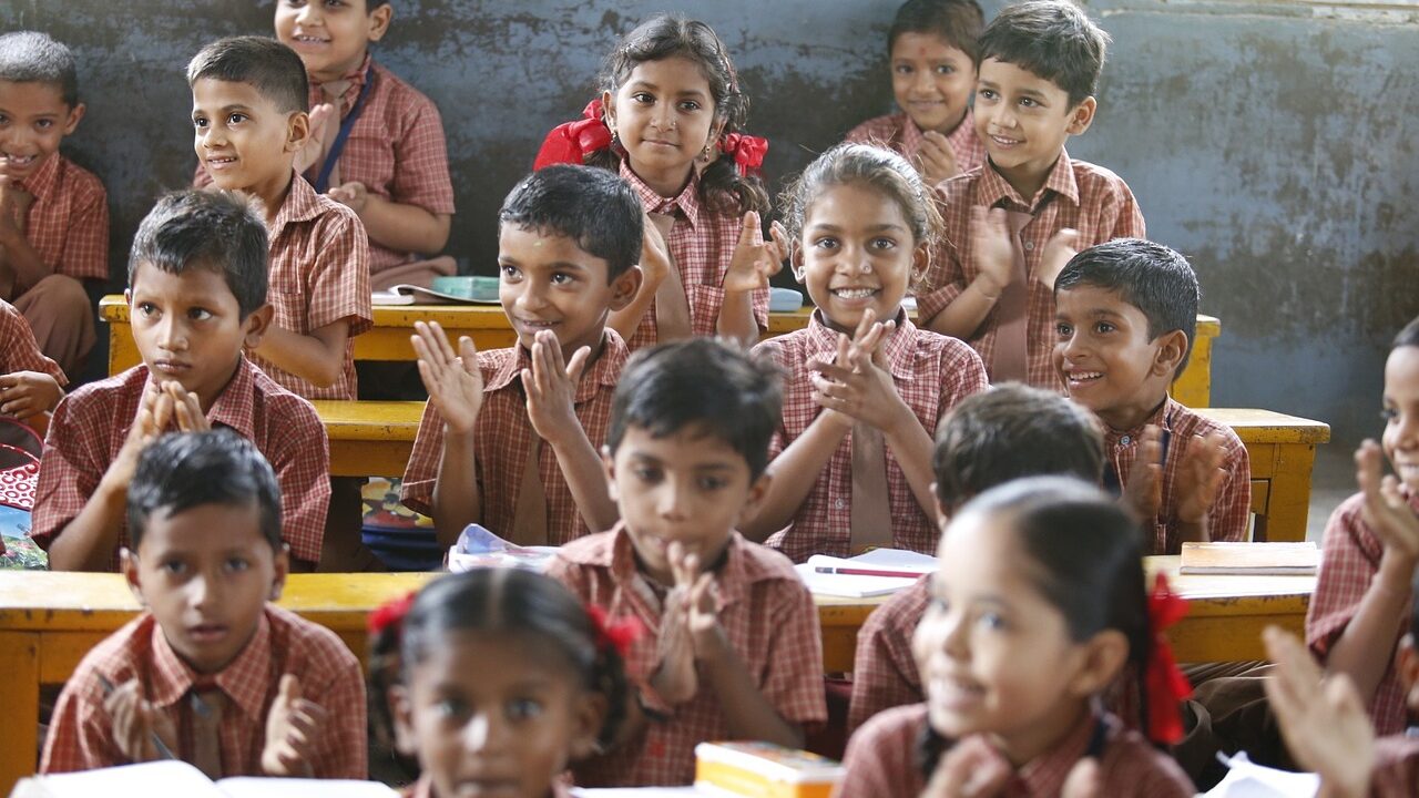 Young children learning foundational skills in a classroom